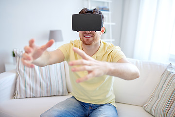 Image showing young man in virtual reality headset or 3d glasses