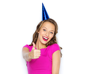 Image showing happy young woman or teen girl in party cap