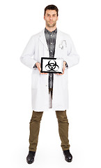 Image showing Doctor holding tablet - Warning! Biohazard!