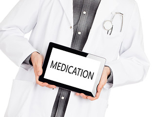 Image showing Doctor holding tablet - Medication