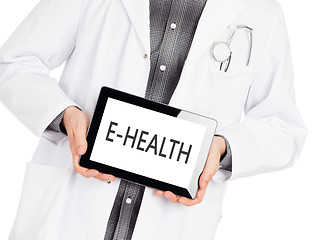 Image showing Doctor holding tablet - E-Health