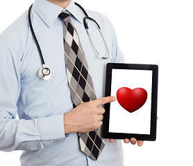 Image showing Doctor holding tablet - Red heart