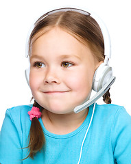 Image showing Young girl is working as an operator at helpline