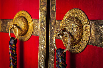 Image showing Decorated door handles of Tibetan Buddhist monastery