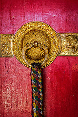 Image showing Decorated door handles of Tibetan Buddhist monastery