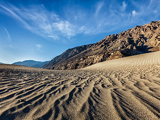 Image showing Sand dunes in mountains