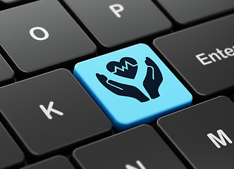 Image showing Insurance concept: Heart And Palm on computer keyboard background