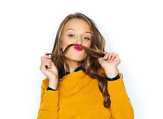 Image showing happy young woman or teen girl in casual clothes