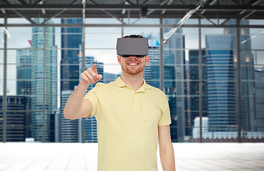 Image showing happy man in virtual reality headset or 3d glasses