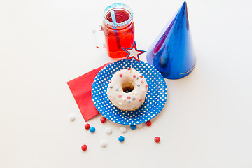 Image showing donut with juice and candies on independence day