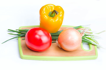 Image showing onions paprica tomato vegetables on  white background