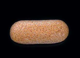 Image showing Large loaf of bread isolated on black