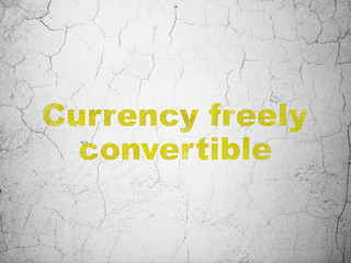 Image showing Money concept: Currency freely Convertible on wall background