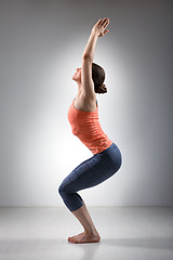 Image showing Woman doing ashtanga vinyasa yoga asana Utkatasana