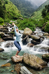 Image showing Sorty fit woman doing yoga asana Utkatasana 