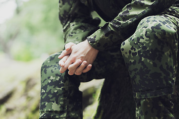 Image showing close up of young soldier in military uniform