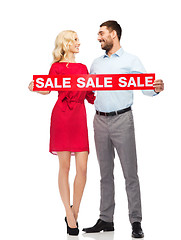 Image showing happy couple with red sale sign