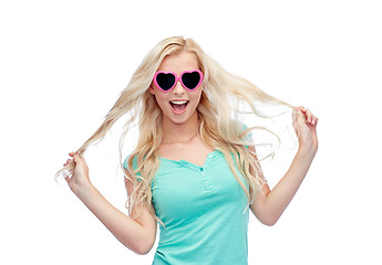 Image showing happy young blonde woman or teenager in sunglasses