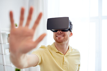 Image showing young man in virtual reality headset or 3d glasses