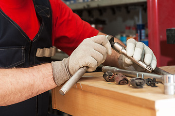 Image showing Professional mechanic working