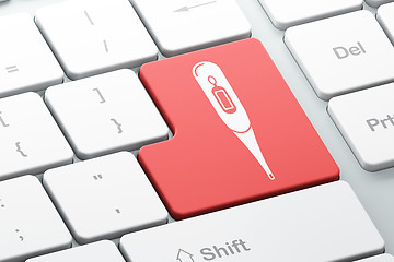 Image showing Health concept: Thermometer on computer keyboard background