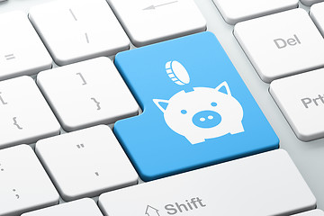 Image showing Money concept: Money Box With Coin on computer keyboard background