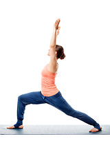 Image showing Sporty woman practices yoga asana 
