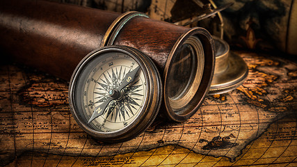 Image showing Old vintage compass on ancient map