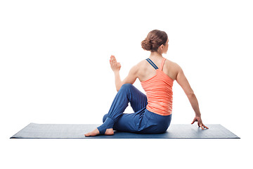 Image showing Sporty fit yogini woman practices yoga asana