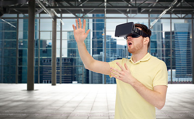 Image showing happy man in virtual reality headset or 3d glasses