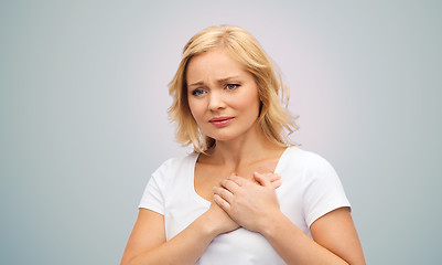 Image showing unhappy woman suffering from heartache