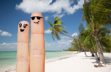 Image showing close up of two fingers with smiley faces