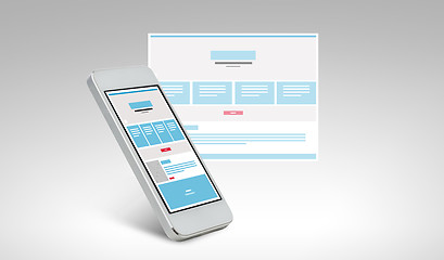 Image showing smarthphone with web page design on screen