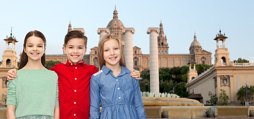 Image showing happy boy and girls hugging