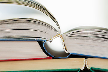 Image showing close up of books on wooden table