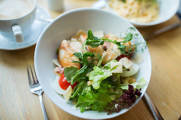 Image showing close up of caesar salad on plate at restaurant