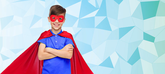 Image showing boy in red super hero cape and mask