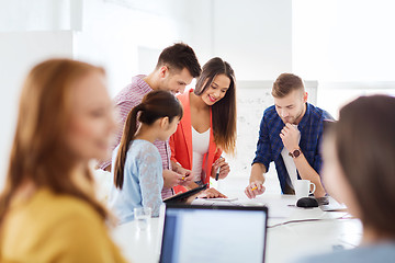 Image showing happy creative team or students working at office