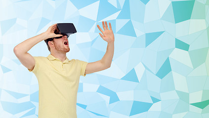 Image showing young man in virtual reality headset or 3d glasses