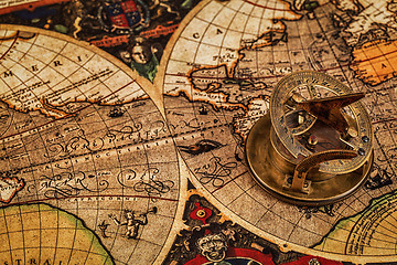 Image showing Old vintage compass on ancient map