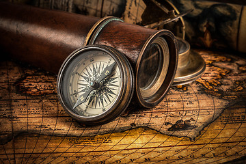 Image showing Old vintage compass on ancient map