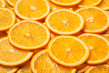 Image showing Colorful orange fruit slices 