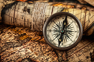 Image showing Old vintage compass on ancient map