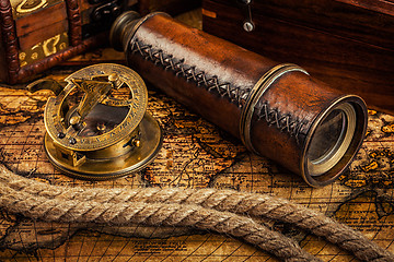 Image showing Old vintage compass on ancient map