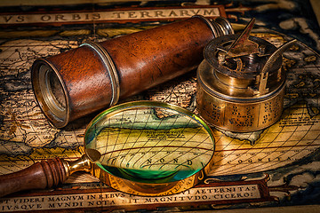 Image showing Old vintage compass on ancient map