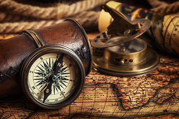 Image showing Old vintage compass on ancient map