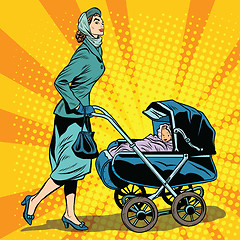 Image showing mom and stroller with baby