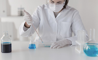 Image showing close up of scientist making test in lab