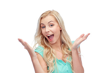 Image showing surprised smiling young woman or teenage girl