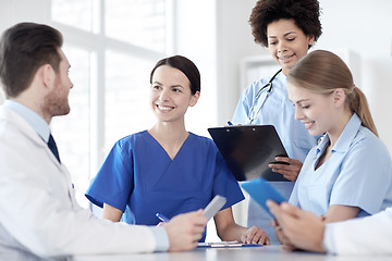 Image showing group of happy doctors meeting at hospital office